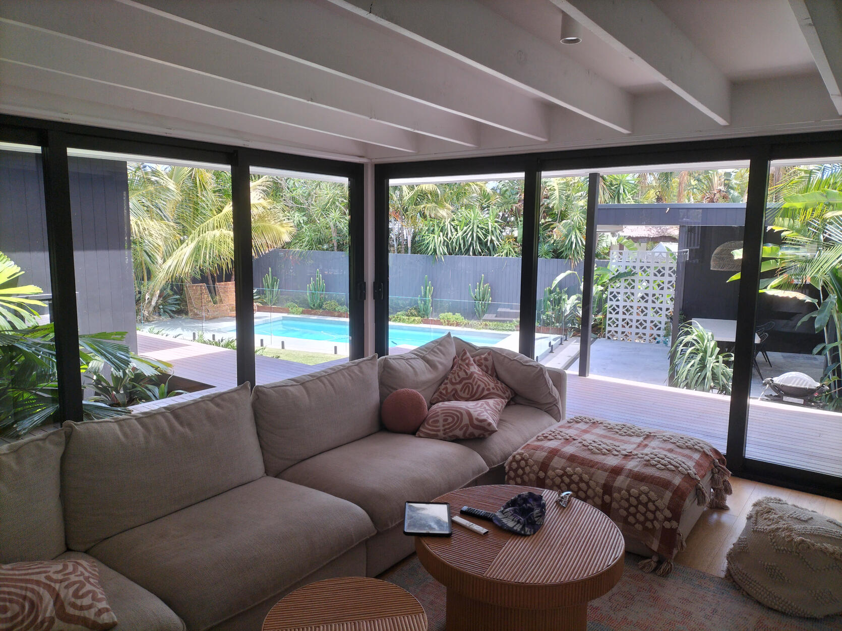 Glass doors and pool fence at a house in Palm Beach